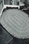 gray and white oval rug pattern