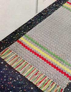 The Gray Rug With Stripes Pattern