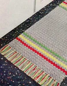 The Gray Rug With Stripes Pattern